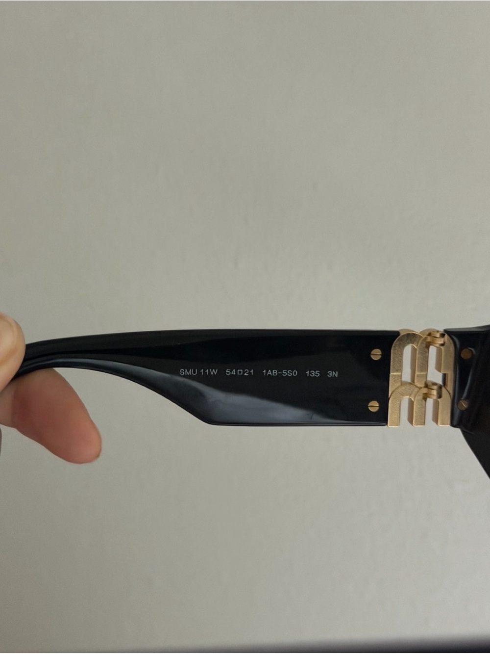 Miu Miu Black Sunglasses with Gold Logo Accent - Picture 6 of 10